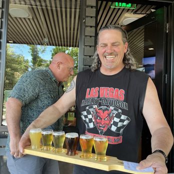 Headlands Brewing - Happy man with a flight of beer! - Breweries Near Me - Lafayette, California