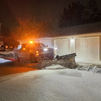 Cutting Edge Lawn Services - a snow plow clearing a driveway - Lawn Services Near Me - Cambria, Wisconsin