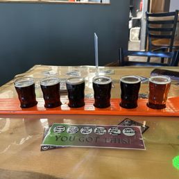 My flight of six tasters, served in a mini ski My flight of six tasters, served in a mini ski