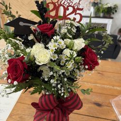 Griffen's Flowers & Gifts - This was a graduation arrangement that was made!