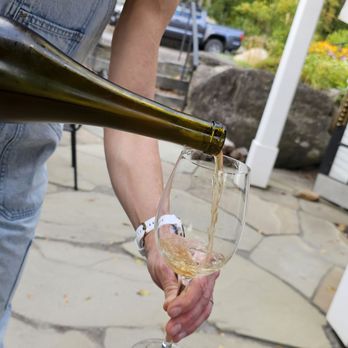 Ellison Estate Vineyard - A lovely pour on the patio - Wineries Near Me - Stowe, Vermont Ellison Estate Vineyard - A lovely pour on the patio - Wineries Near Me - Stowe, Vermont