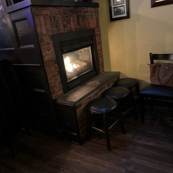 Olde Main Street Pub - a fireplace in the corner - New American Near Me - Salem, Massachusetts Olde Main Street Pub - a fireplace in the corner - New American Near Me - Salem, Massachusetts