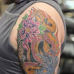 JW's Archangel Tattoo - Tattoo with flowers and a snake