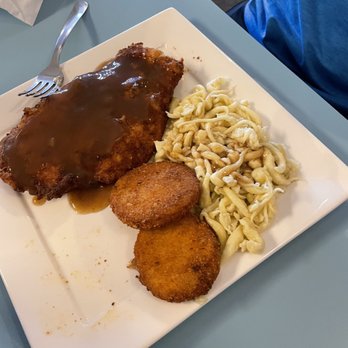 Schnitzel House - This is the bacon schnitzel, spatzle, and fried potatoes! - German Near Me - Fort Myers Beach, Florida