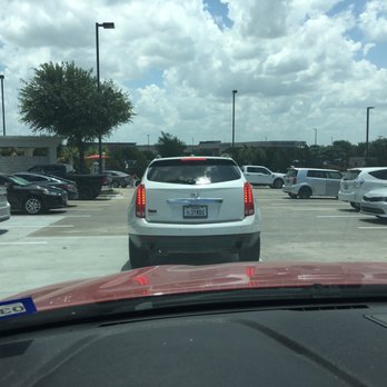 In-N-Out Burger - ows a parking lot full of cars - Burgers Near Me - Rockwall, Texas In-N-Out Burger - ows a parking lot full of cars - Burgers Near Me - Rockwall, Texas