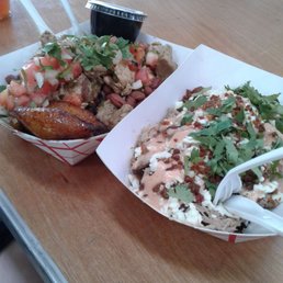 Loaded maduro.chicken and rice.both with plantains.Rolling Chefs.