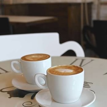 Lolli Bop - two cups of coffee on a table - Cafes Near Me - Lawrence, New York Lolli Bop - two cups of coffee on a table - Cafes Near Me - Lawrence, New York