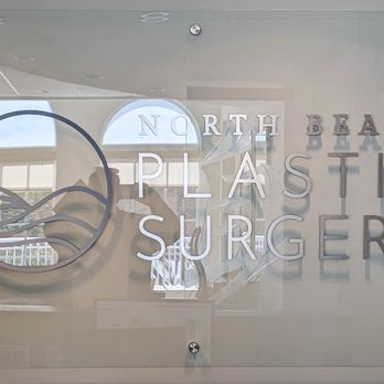 North Beach Plastic Surgery - This is a closeup of the business sign.  Photo taken March 25, 2024. - Plastic Surgeons Near Me - Virginia Beach, Virginia