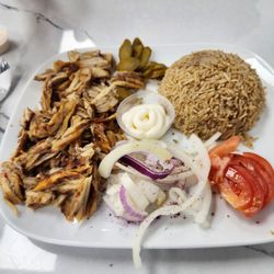 Sindbad Restaurant - Chicken shawarma with brown rice. Full plate.
