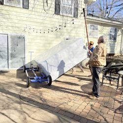 Recreation Wholesale - Our 2 installers made it look easy to place the unit!