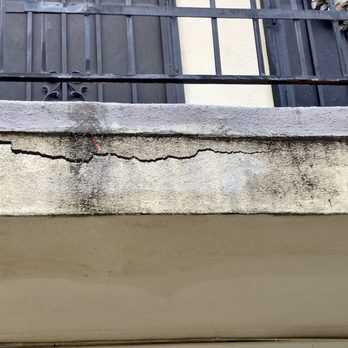 Phan Property Management - Upstairs walkway cracking. - Property Management Near Me - Long Beach, California