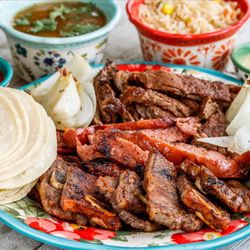 Mr-Rico Pollo Loco - Mixed plate: ribs, sausage, beef, rice, beans, tortillas, grilled onion, lime & salsa