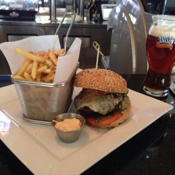 Solstice Restaurant & Wine Bar - Kobe beef burger with pancetta. Served with parmigiano and truffle oil fries - Italian Near Me - Mississauga, Ontario