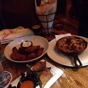 The Publick House - Monk's frites, mac & cheese, duck confit spring rolls, and sriracha buffalo wings - Pubs Near Me - Brookline, Massachusetts The Publick House - Monk's frites, mac & cheese, duck confit spring rolls, and sriracha buffalo wings - Pubs Near Me - Brookline, Massachusetts