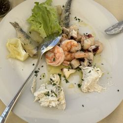 Trattoria SAN Basilio di Borghi Stefano - Seafood antipasti, cod fish cream, shrimp and octopus and plus sardines.