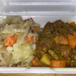 FAT CHEF AUTHENTIC JAMAICAN CUISINE - Curried goat, cabbage and rice( under the cabbage)