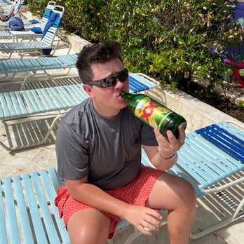 Paradise Beach - Dos Equis are served in 40oz bottles - Mexican Near Me - Cozumel, ROO
