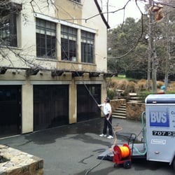 Best View Services - BVS cleaning the second story french framed windows with an ultra pure water fed pole. Best, safest and quickest way to clean.