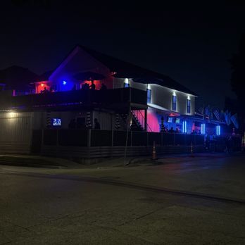 Varsity - Outside of the new Varsity Bar HTX at night - Gay Bars Near Me - Houston, Texas