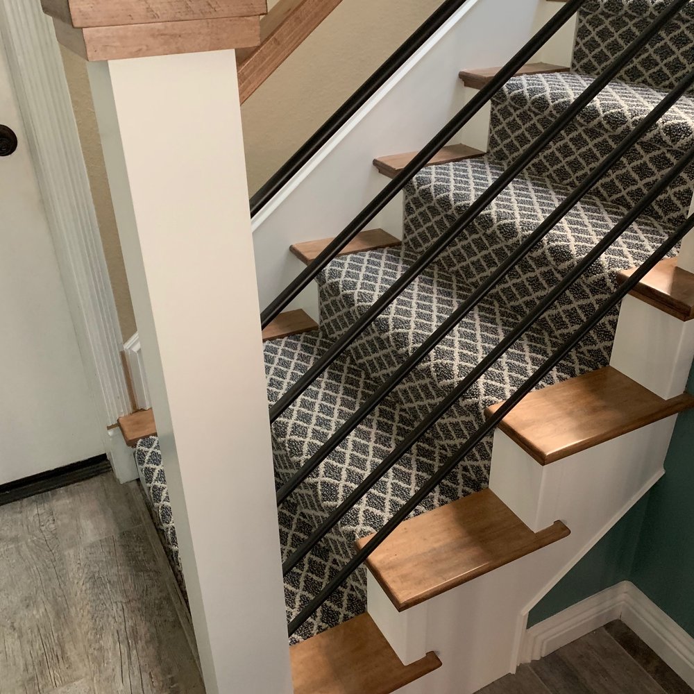 Stairs Plus More - Bottom post and horizontal bars installed.   Prefect craftsmanship - General Contractors Near Me