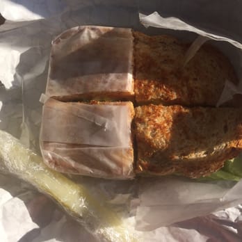 Colette's Cafe - Chicken melt on multigrain bread and pickle...cut into fours on request. - Cafes Near Me - Greenbelt, Maryland