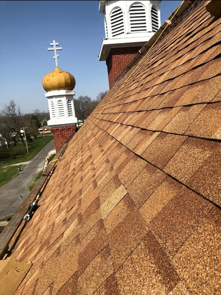 Slide of Rashids Roofing