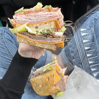 Just Baked Bakery and Deli - Stacked club with turkey, ham, and roast beef on toasted sourdough. - Bakeries Near Me - Yukon, Oklahoma Just Baked Bakery and Deli - Stacked club with turkey, ham, and roast beef on toasted sourdough. - Bakeries Near Me - Yukon, Oklahoma