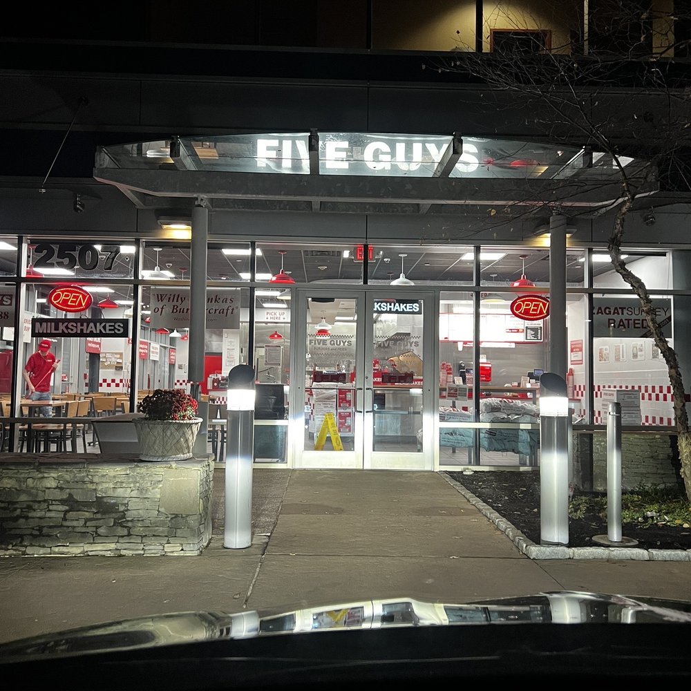 the entrance to a fast food restaurant the entrance to a fast food restaurant
