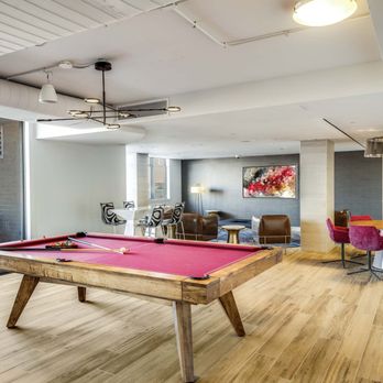 Camden Potomac Yard Apartments - Resident lounge with billiards table and lounge seating at Camden Potomac Yard apartments in Arlington, VA. - Apartments Near Me - Arlington, Virginia Camden Potomac Yard Apartments - Resident lounge with billiards table and lounge seating at Camden Potomac Yard apartments in Arlington, VA. - Apartments Near Me - Arlington, Virginia