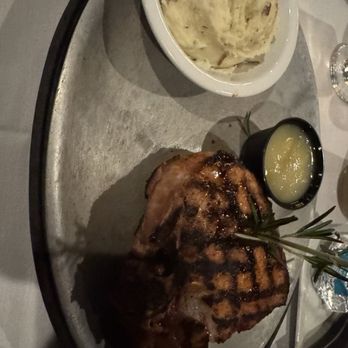 Nightingale Supper Club - Grilled pork chop with garlic mashed potato side - Cocktail Bars Near Me - Sturgeon Bay, Wisconsin