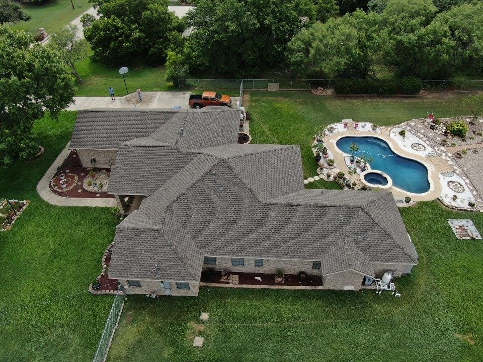 Slide of Magnolia Roofing & Restoration