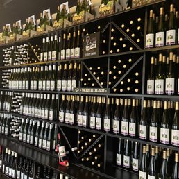 rows of bottles of wine rows of bottles of wine