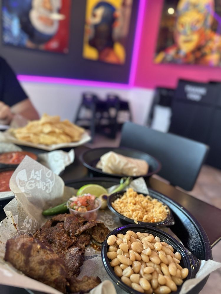 Ay Guey Taqueria Bar Logo