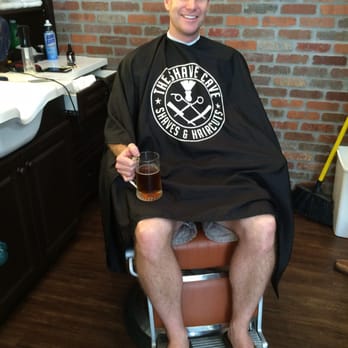 The Shave Cave - My wingman, "Fresh", getting his ears lowered with local pint in hand. - Barbers Near Me - St. Petersburg, Florida The Shave Cave - My wingman, "Fresh", getting his ears lowered with local pint in hand. - Barbers Near Me - St. Petersburg, Florida