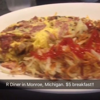 R Diner - Meatlovers omelette with hash browns (screenshot from video) - Breakfast & Brunch Near Me - Monroe, Michigan R Diner - Meatlovers omelette with hash browns (screenshot from video) - Breakfast & Brunch Near Me - Monroe, Michigan