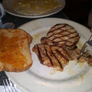 Thumbs Up Diner - My husband's grilled pork chops and LARGE bowl of grits. - Breakfast & Brunch Near Me - Atlanta, Georgia Thumbs Up Diner - My husband's grilled pork chops and LARGE bowl of grits. - Breakfast & Brunch Near Me - Atlanta, Georgia