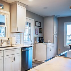 Aladdin Carpet & Floors - Modern Kitchen with white cabinet and subway backsplash Design and installed by Aladdin carpet and floors