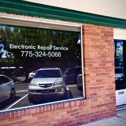 Electronic Repair Service - Storefront of Electronic Repair Service in "Midtown Reno" with parking in front of the store if you're lucky.