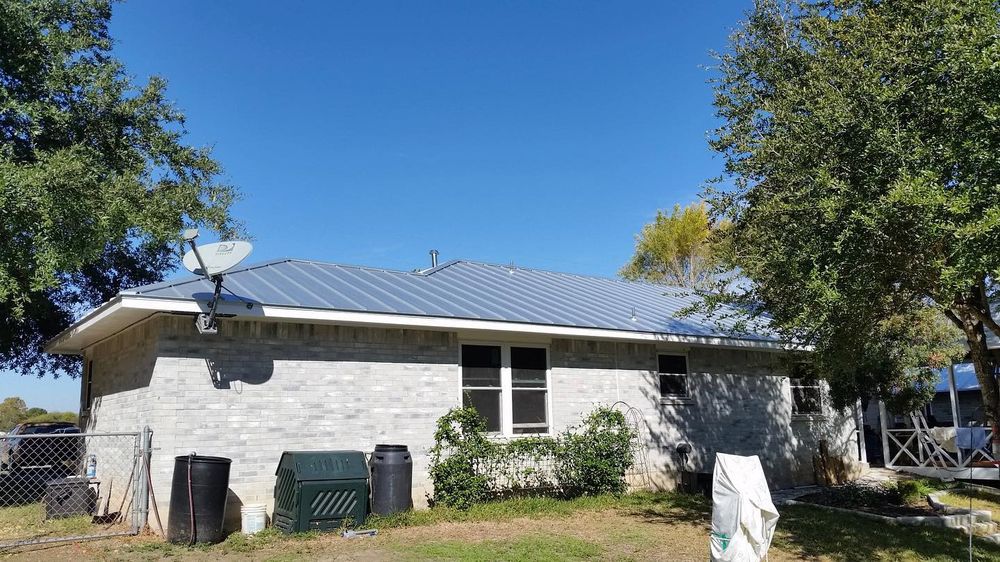 Slide of Roland's Roofing