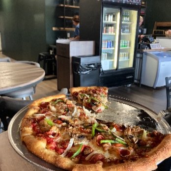 Steampunk Pizza - The "Pantry" Pizza. Italian sausage, cup & char pepperoni, green peppers, onions, fresh mushrooms, mozzarella, red sauce base - Pizza Near Me - Ashland, Virginia Steampunk Pizza - The "Pantry" Pizza. Italian sausage, cup & char pepperoni, green peppers, onions, fresh mushrooms, mozzarella, red sauce base - Pizza Near Me - Ashland, Virginia
