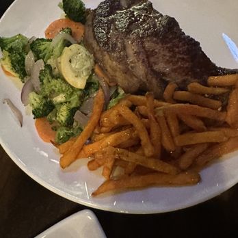 Back Room Steakhouse - 16oz Ribeye Sweet potato Fries drizzled with honey veg medley - Steakhouses Near Me - Apopka, Florida