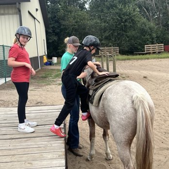 Bunker Park Stable - Learning how to get on the horse for the first time. - Horseback Riding Near Me - Andover, Minnesota