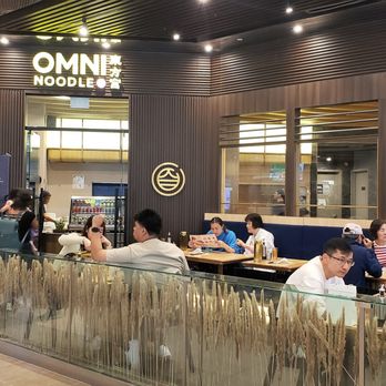 Omni Noodle - people sitting at tables in a restaurant - Noodles Near Me - Toronto, Ontario