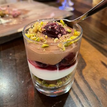 Rascals Tavern - Chocolate parfait with pistachio crumbs - Bars Near Me - Greensboro, North Carolina