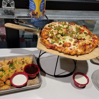 The Redd Dog - Tater tots, carnivore pizza and giant pretzel! - Bars Near Me - Tacoma, Washington