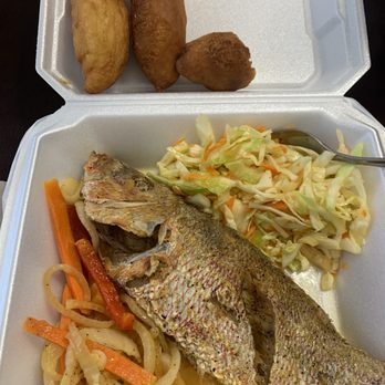 The Jerk Grill - Escovitch fish (fried snapper with pickled vegetables), festivals, and slaw. - Caribbean Near Me - Oviedo, Florida The Jerk Grill - Escovitch fish (fried snapper with pickled vegetables), festivals, and slaw. - Caribbean Near Me - Oviedo, Florida