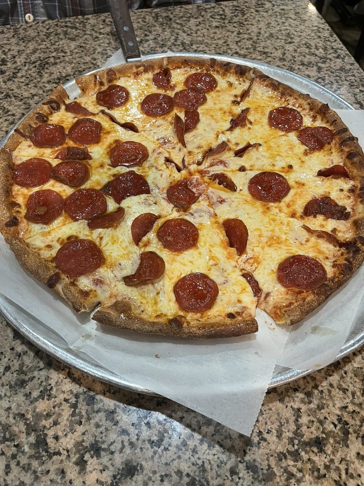 Andy's Pizza & Steak House Logo