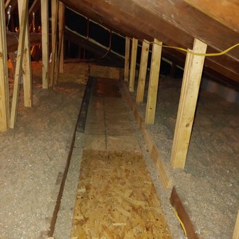 Comfort Squad Heating & Cooling - Cellulose insulation and walkway to water heater and storage - Heating & Air Conditioning/HVAC Near Me - Sugar Land, Texas