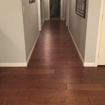 The Floor Store - a hallway with hardwood floors - Carpeting Near Me - Chandler, Arizona