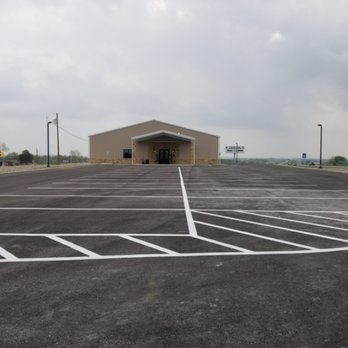 Young's Daughters Funeral Home - General parking and non-processional parking is in front of building. Two Handicapped parking spots on the left and right of pillars. - Cremation Services Near Me - Temple, Texas Young's Daughters Funeral Home - General parking and non-processional parking is in front of building. Two Handicapped parking spots on the left and right of pillars. - Cremation Services Near Me - Temple, Texas